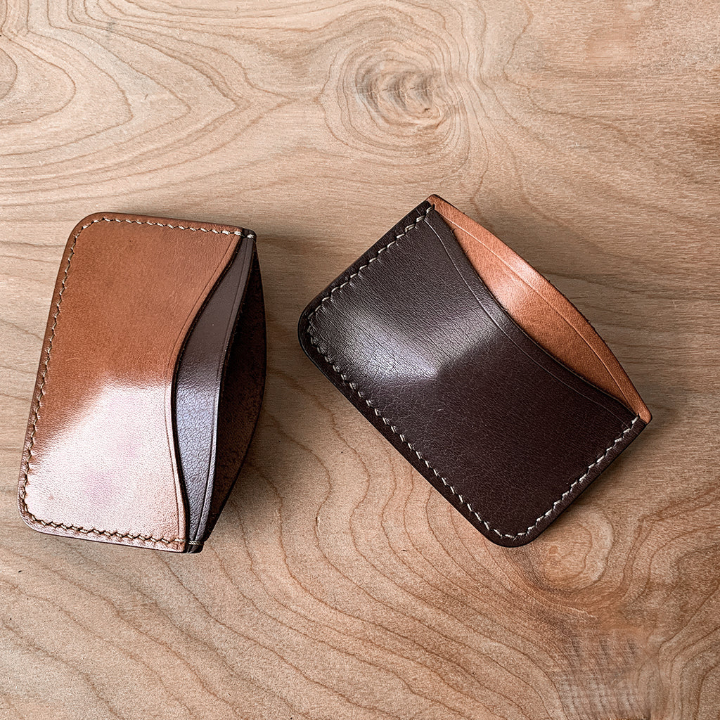 brown and tan leather card holder